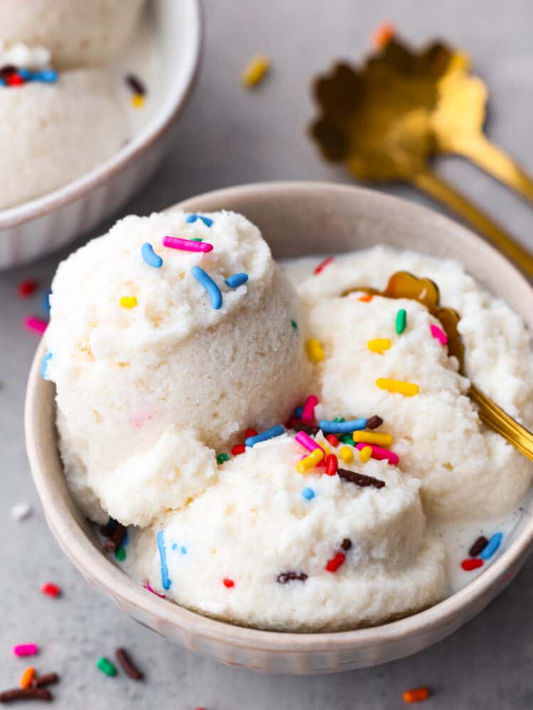 Ice cream in a bowl with sprinkles.