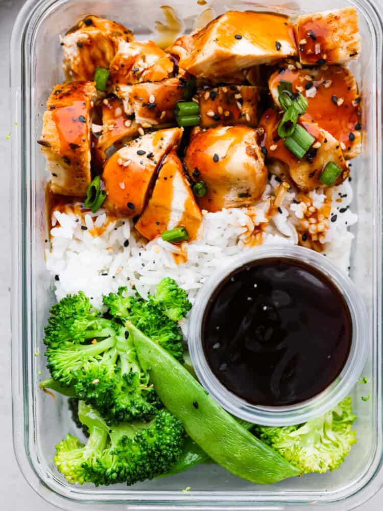 A close up of a teriyaki chicken meal prep bowl.