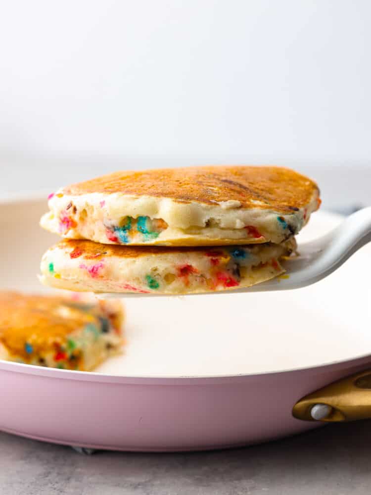 A spatula scooping up the funfetti pancakes.