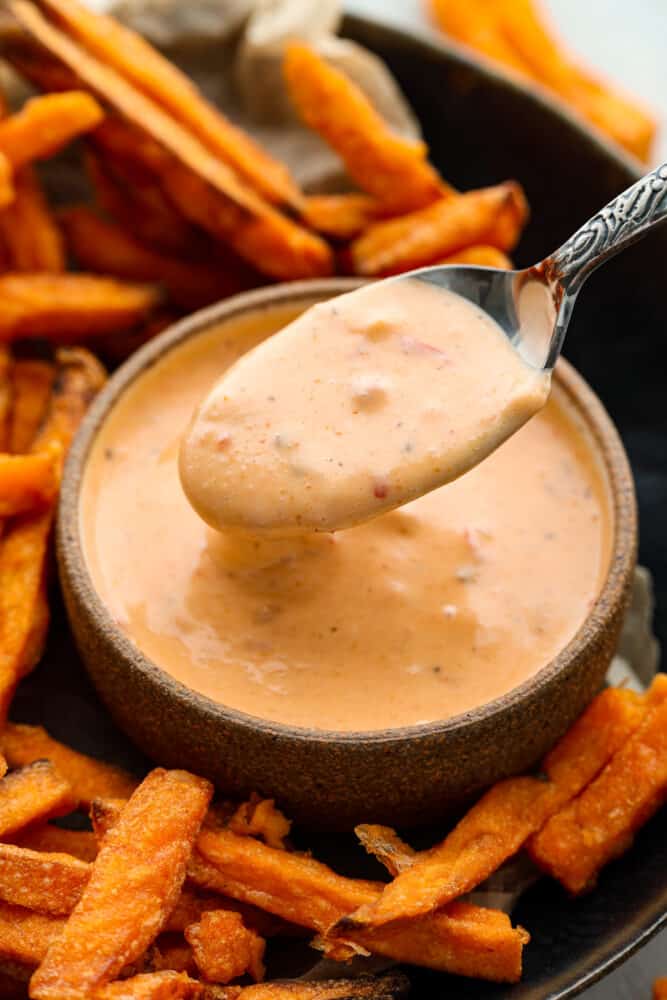 Boom boom sauce in a bowl with sweet potato fries