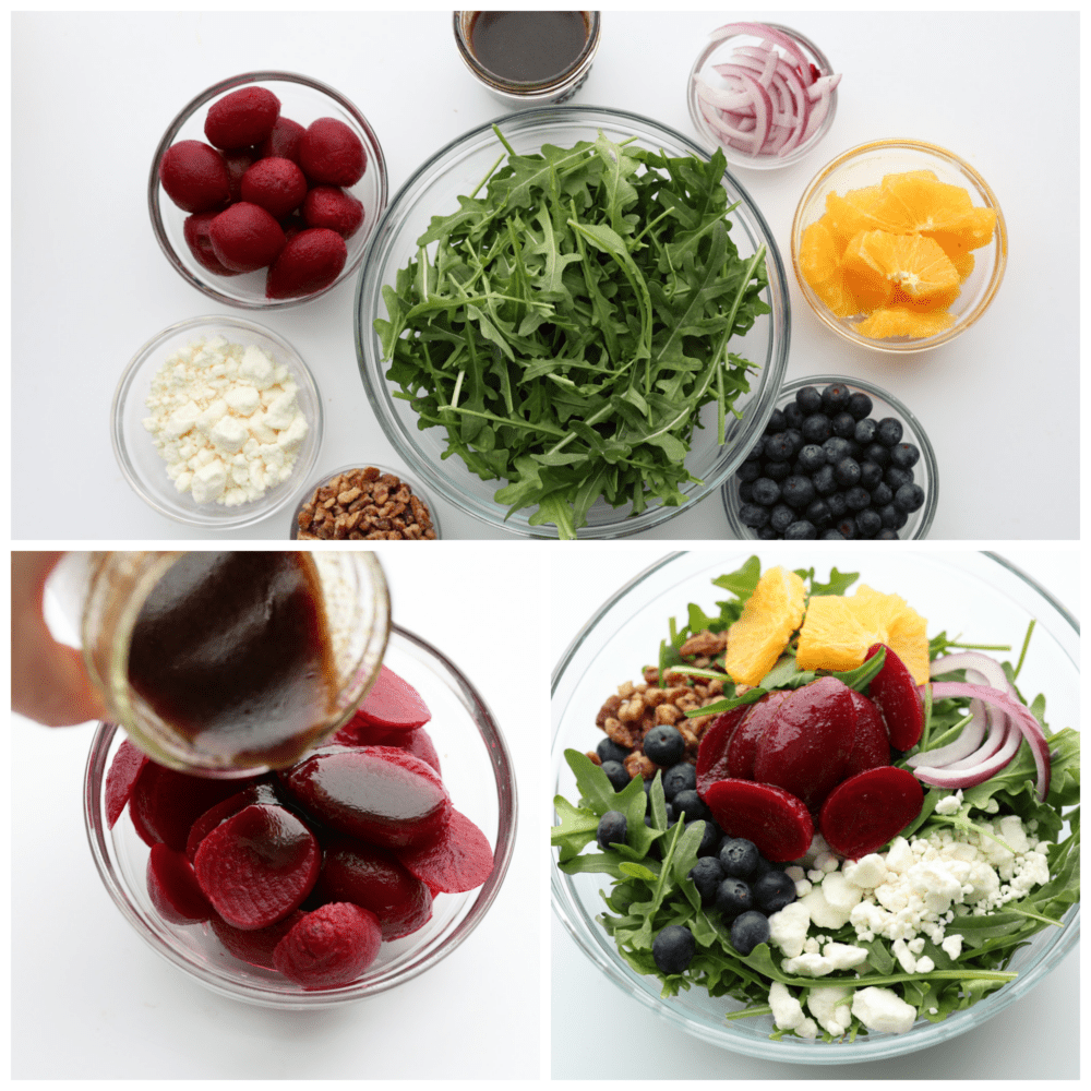 Greens, oranges, onions, blueberries, cheese, nuts, and roasted beets all being added to a glass bowl and then mixed together.