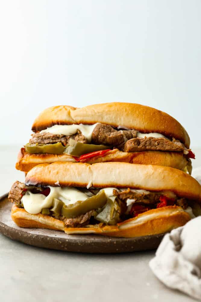 Slow cooker philly cheesesteaks on a plate.