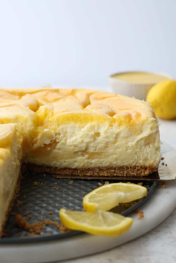 Cheesecake with a slice cut out of it.