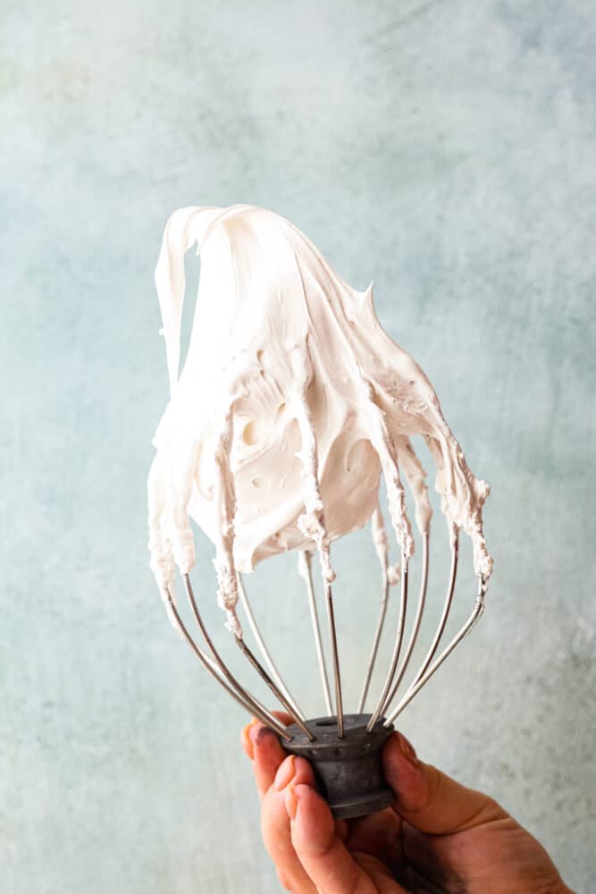 Marshmallow fluff on a whisk attachment.
