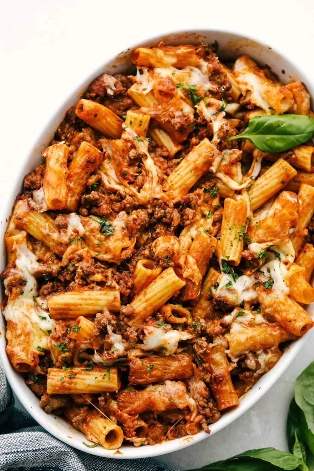 Baked rigatoni in a white bowl. 
