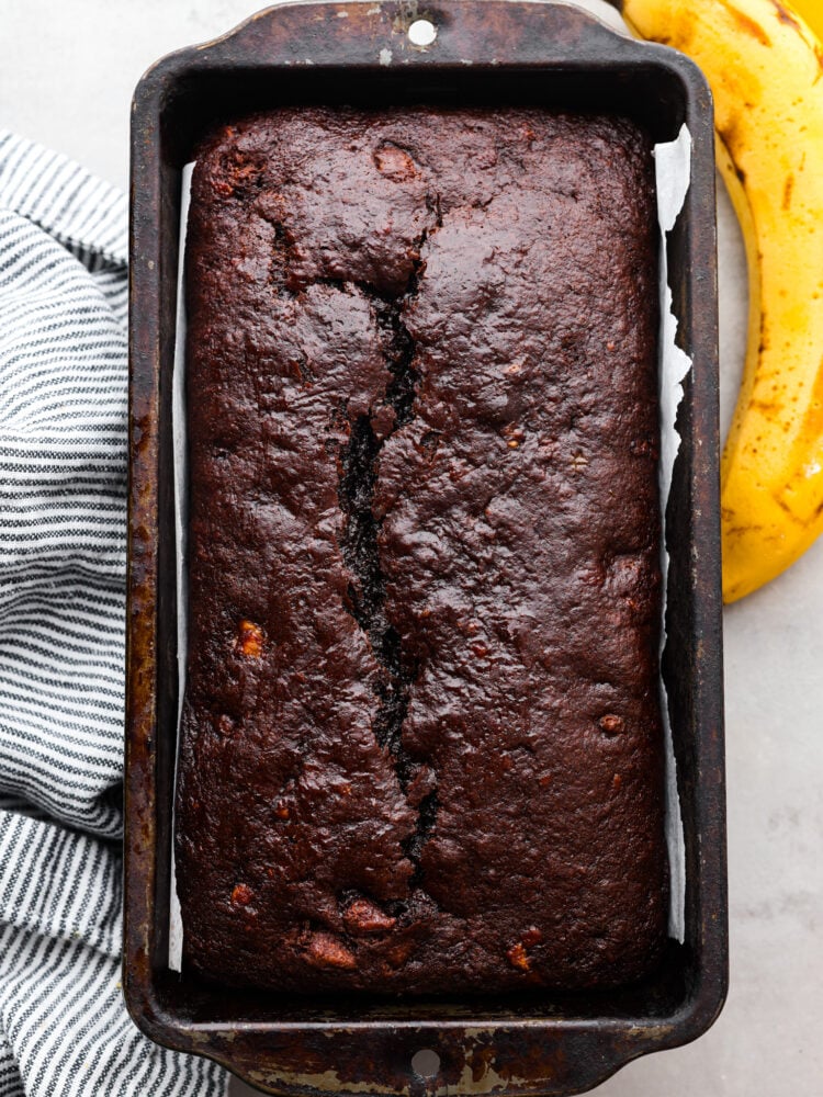 Top view of chocolate banana bread baked in a loaf pan.