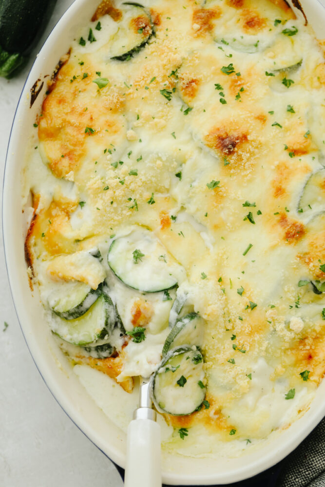 Parmesan Zucchini Gratin in a white dish.