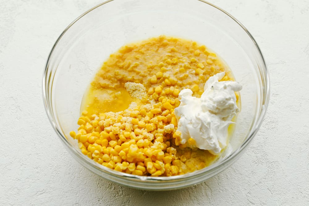 5 ingredient Corn Casserole ingredients in a bowl.