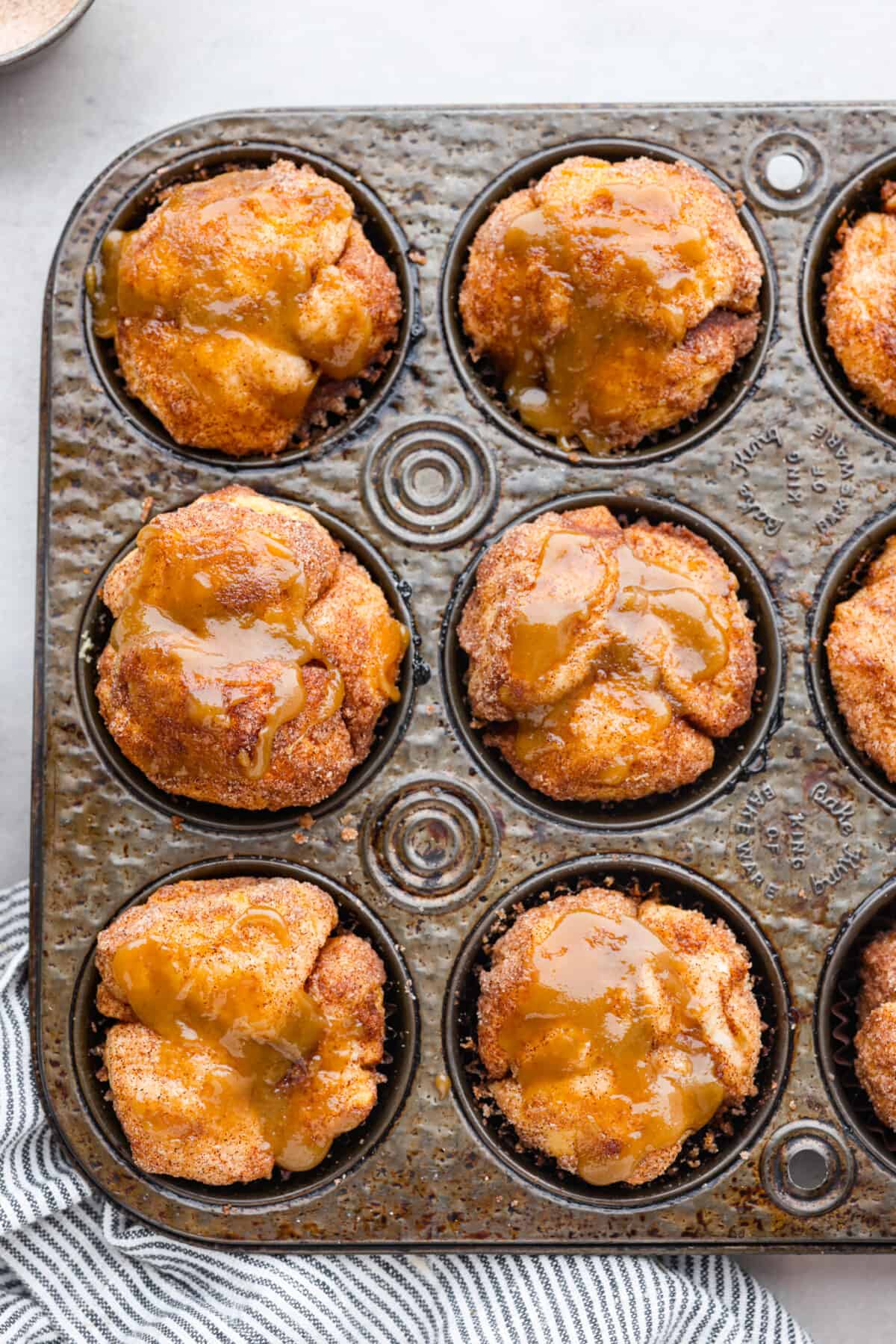 Top-down view of monkey bread muffins in a muffin tin.