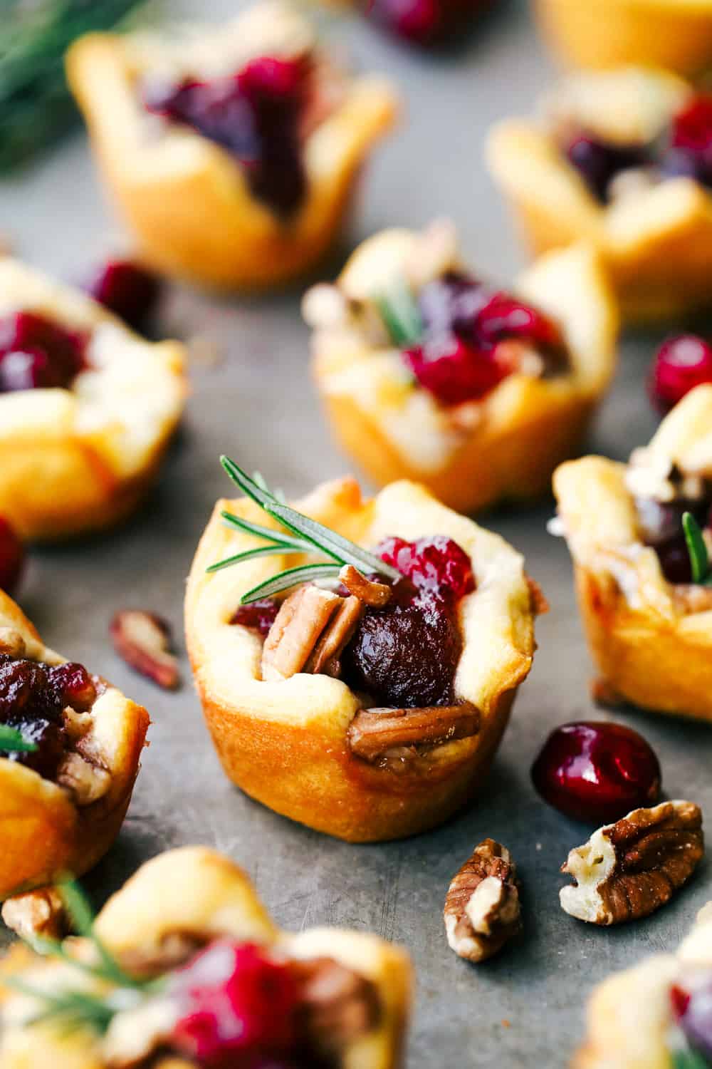 Zoomed in picture of cranberry pecan brie bites. 