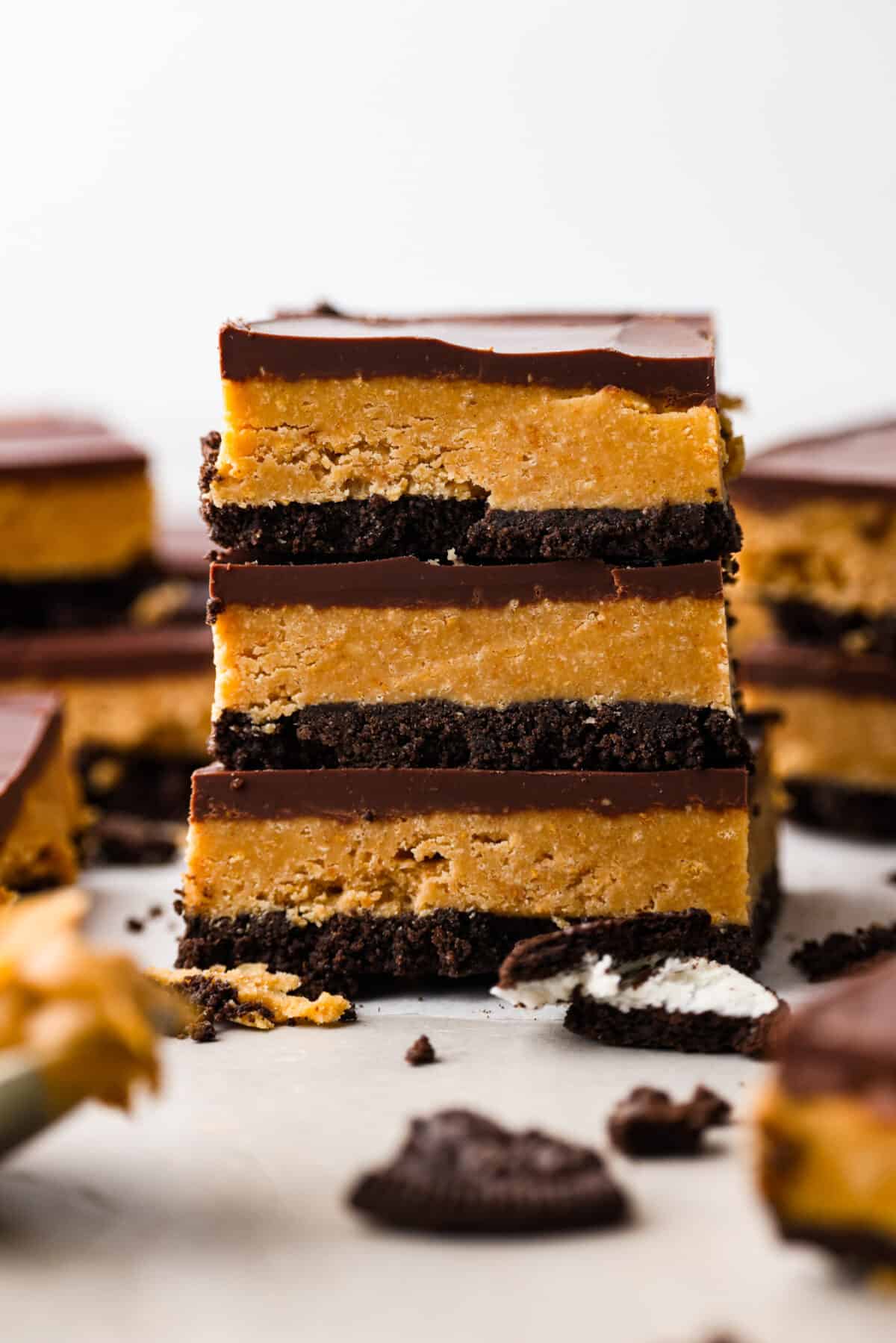 3 Oreo peanut butter bars stacked on top of each other.