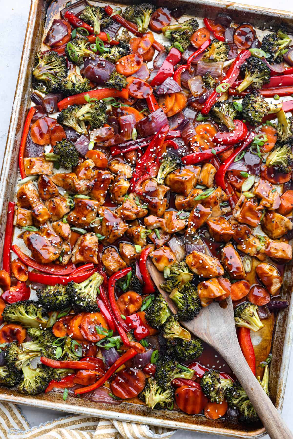 Top view of sheet pan teriyaki chicken with vegetables.