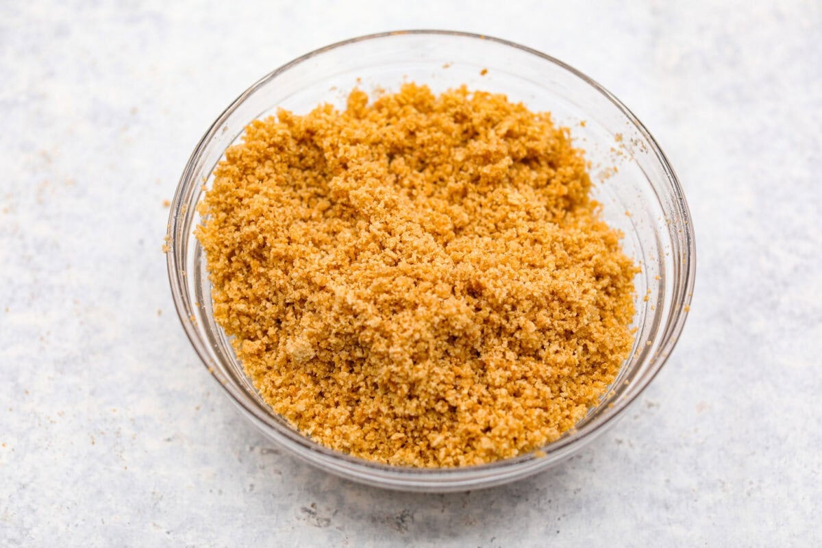 Overhead shot of bowl of crushed crust ingredients. 