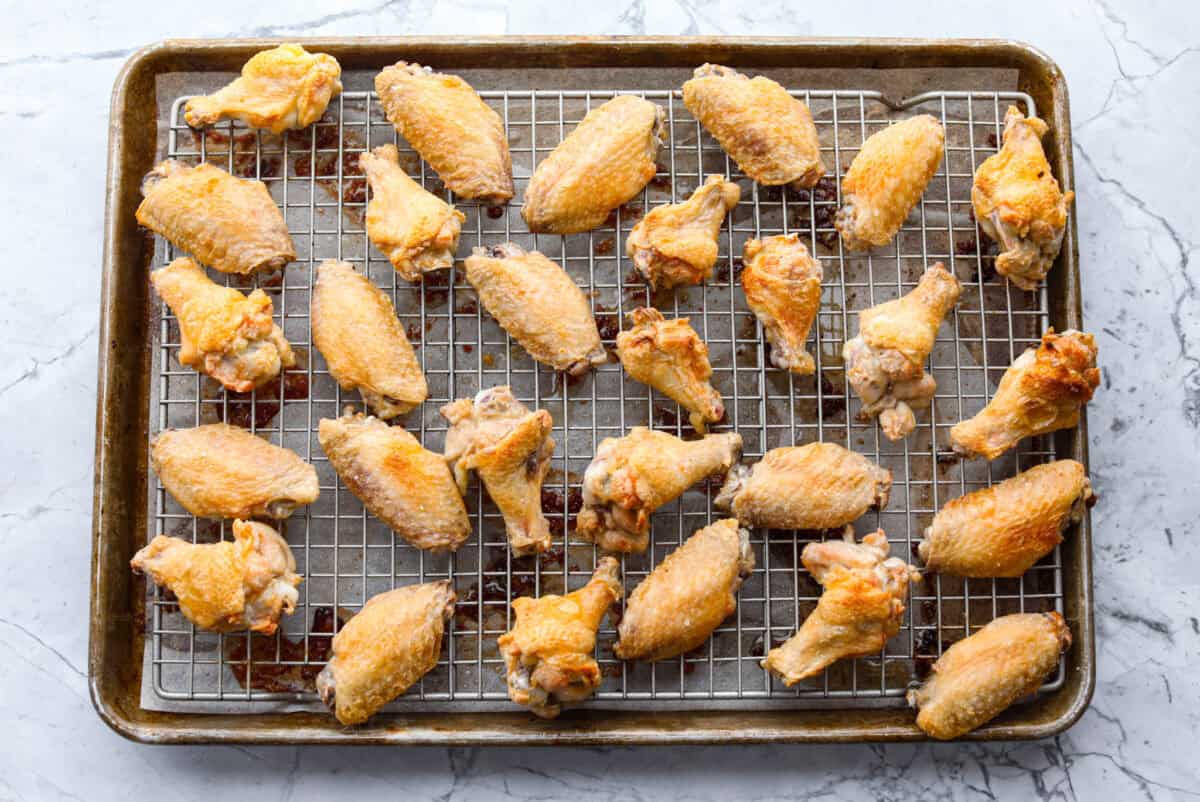 Baked wings on baking rack.