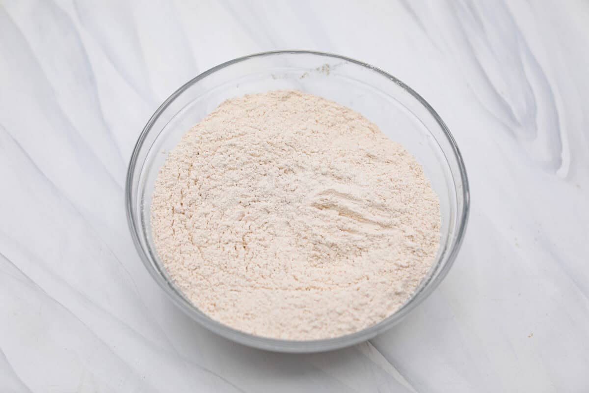 Overhead shot of a bowl of dry ingredients mixed together in a bowl. 