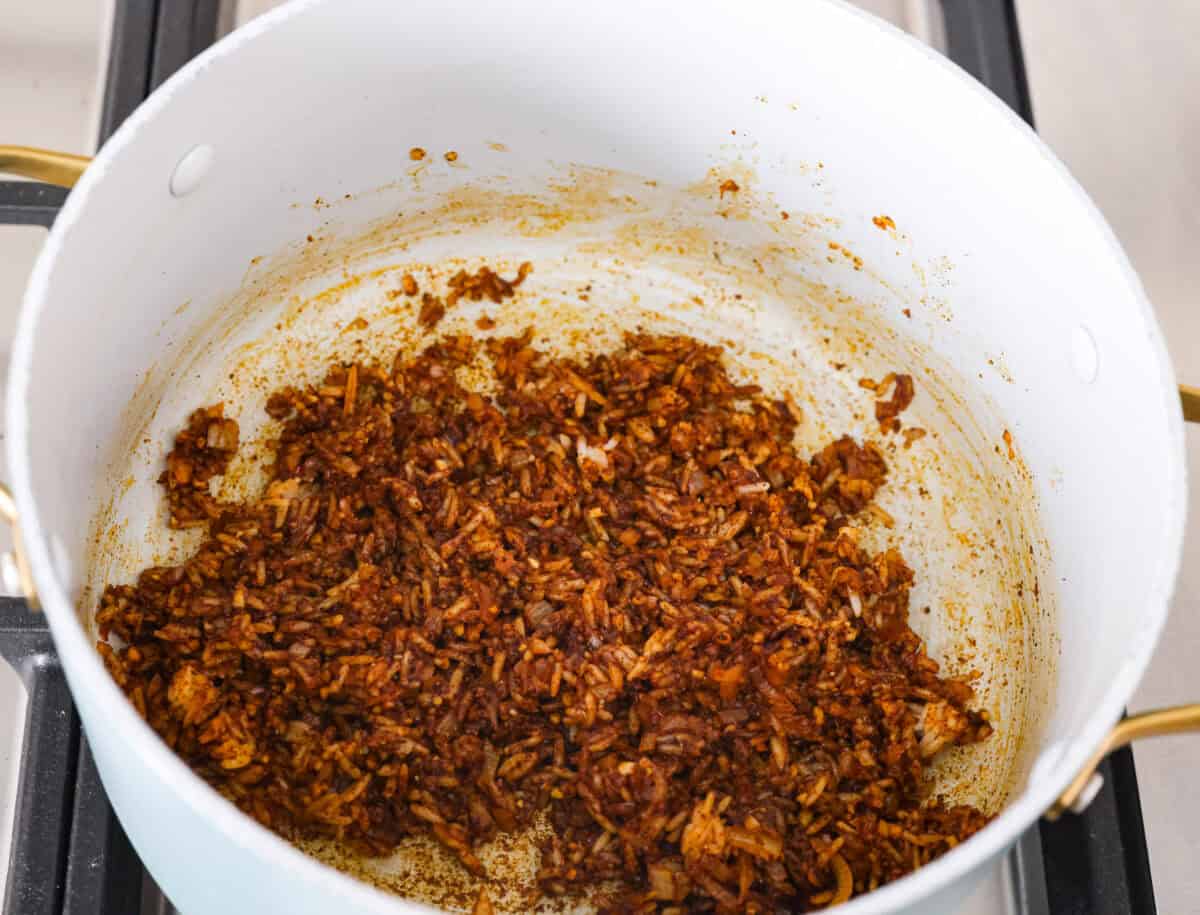 Hungarian cabbage rolls are packed with rich, hearty flavors in every bite! I know you love a good cabbage roll and can’t get enough of my Hungarian goulash, so I knew this recipe would be perfect. The minced garlic, cooked white rice, paprika, salt, and pepper in the pot with the sautéd onion.
