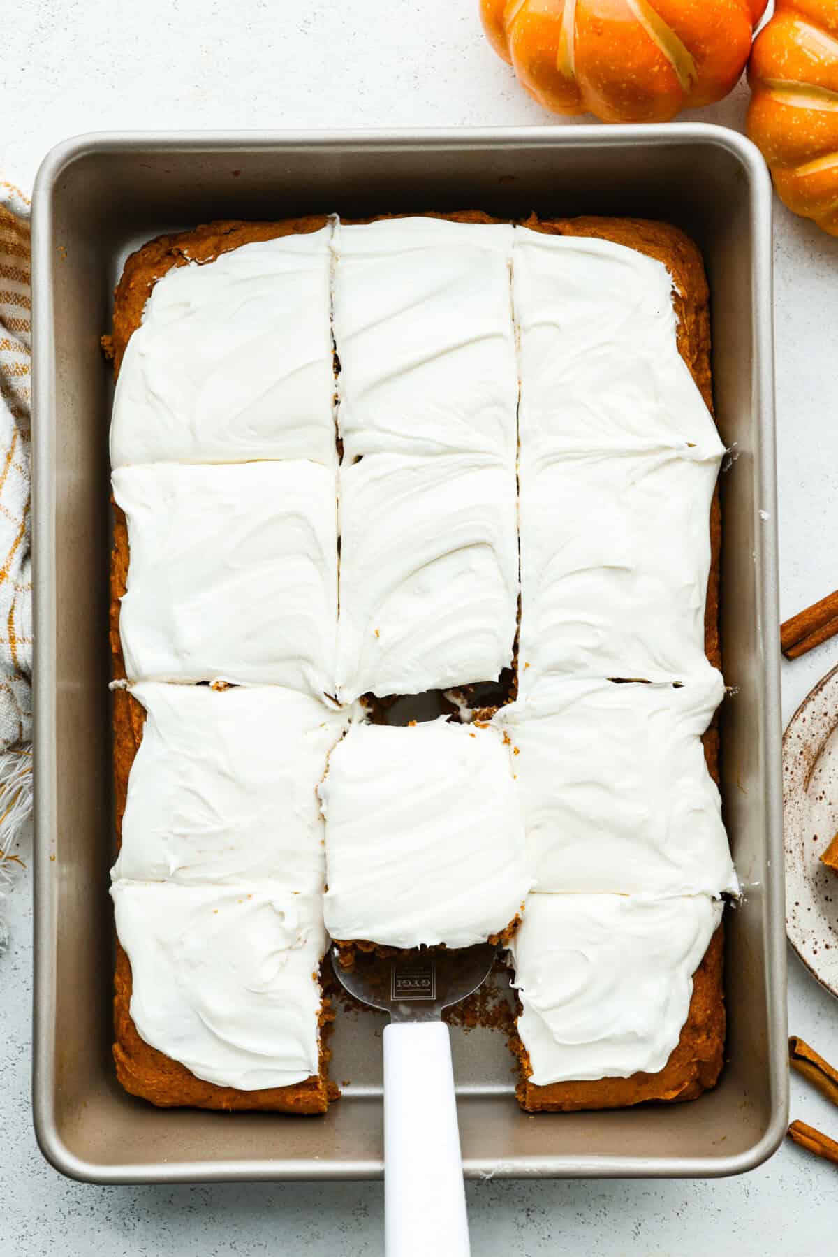 Overhead shot of 2 ingredient pumpkin cake frosted with cream cheese frosting. 