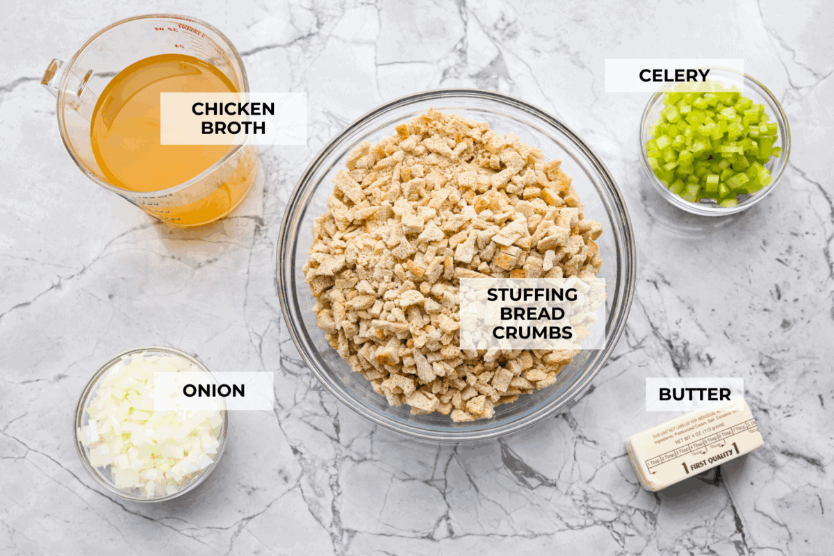 This 5-ingredient stuffing has the same buttery, herby taste as the traditional recipe. All the flavor of classic Thanksgiving stuffing on a budget! You don’t need a long ingredient list to get big holiday flavor. Overhead shot of labeled ingredients.