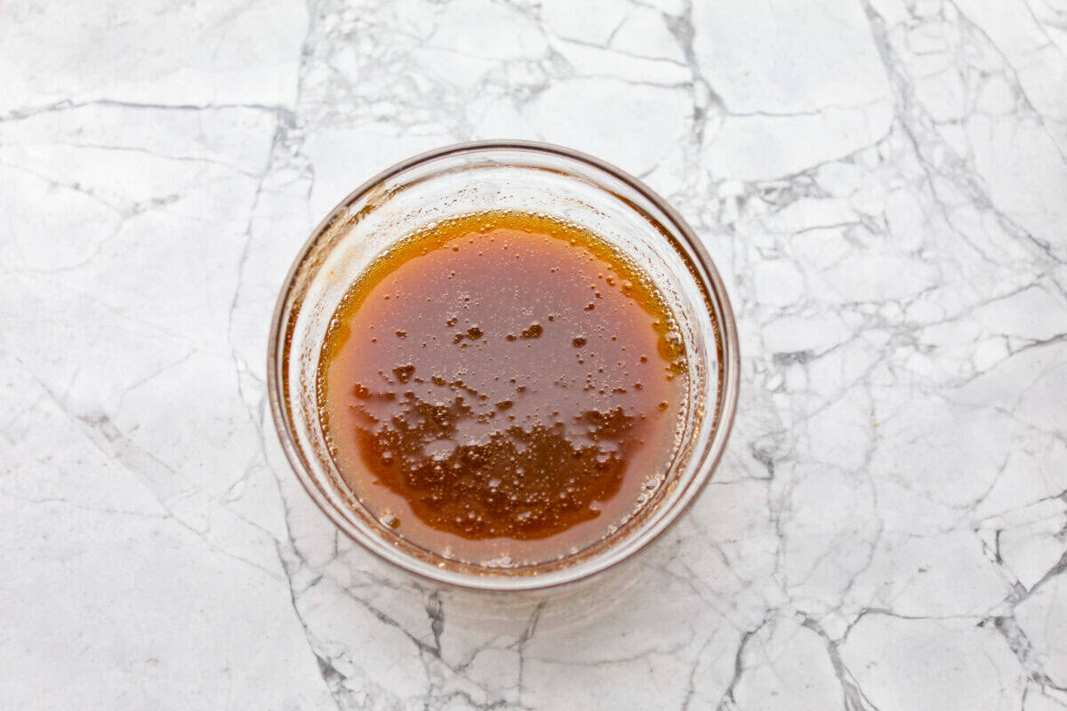 I love bacon. I love Brussels sprouts. Put them together and I’m sold. But the secret to these bacon-wrapped Brussels sprouts? A drizzle of maple syrup! It makes them sweet, smoky, and completely irresistible. Bowl of maple syrup and brown sugar whisked together.