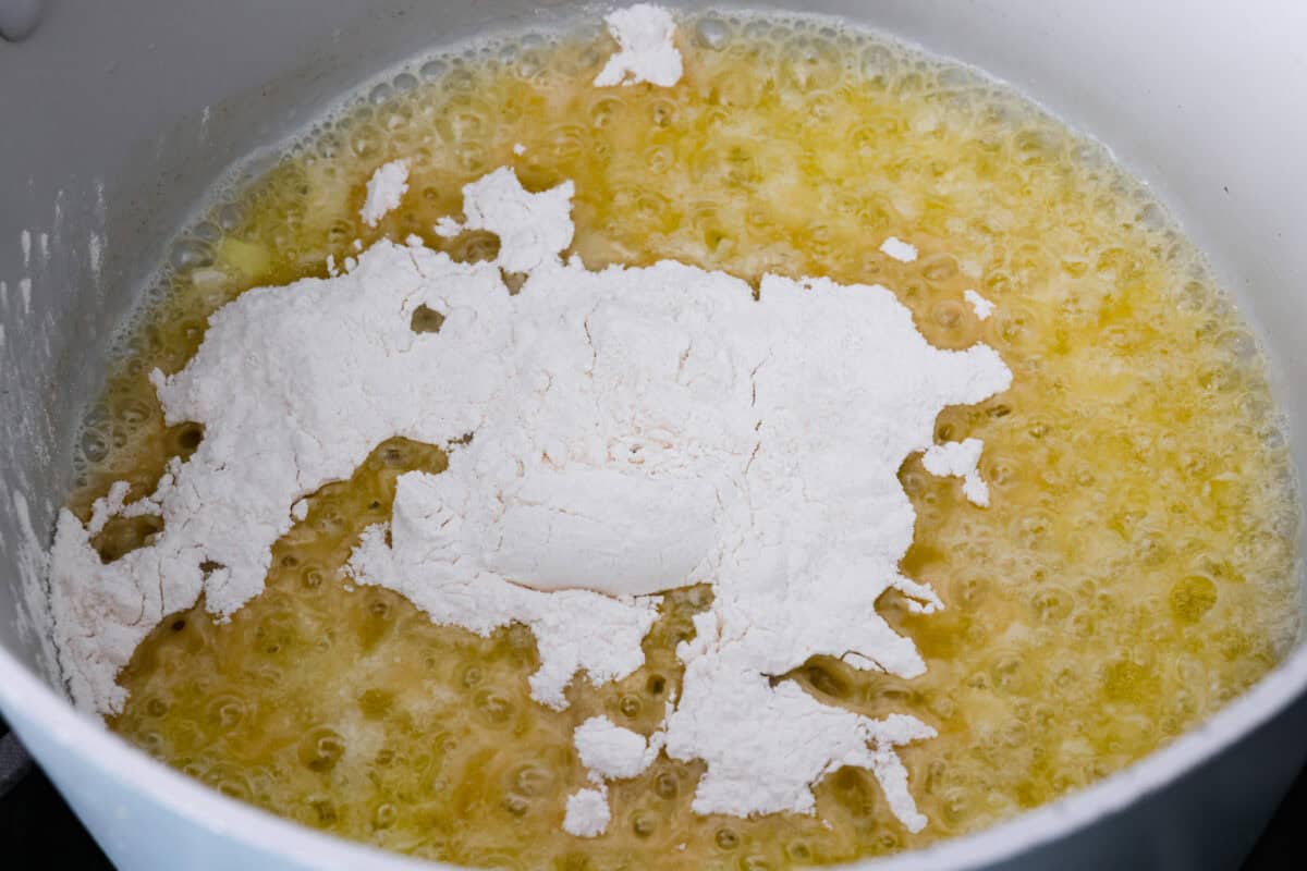 Onions, melted butter and flour in pot.