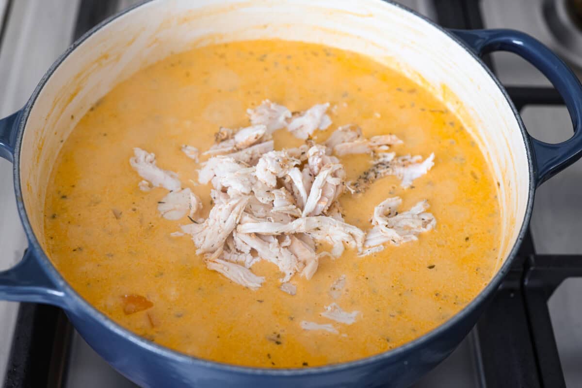 Cooked and shredded chicken added to the creamy soup. 