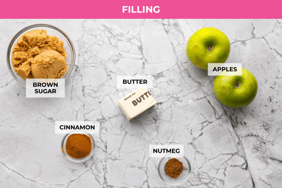 These Caramel Apple Cinnamon Rolls are soft, gooey, and baked with cozy fall flavor in every bite. The homemade dough bakes up perfectly fluffy, and the rich caramel topping makes them feel extra special. Overhead shot of labeled filling ingredients.