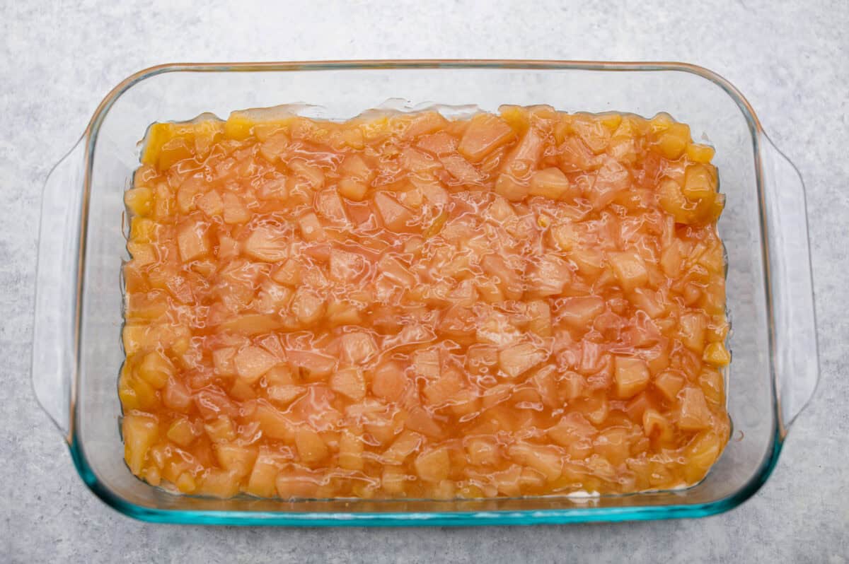 Caramel Apple Pie Lush is the easiest fall dessert you’ll ever make! With layers of buttery crust, creamy cheesecake, spiced apples, caramel, and whipped topping, it’s a yummy fall treat that is so much easier than baking a pie from scratch! Apple pie filing layer aded to the top of the cream cheese layer.