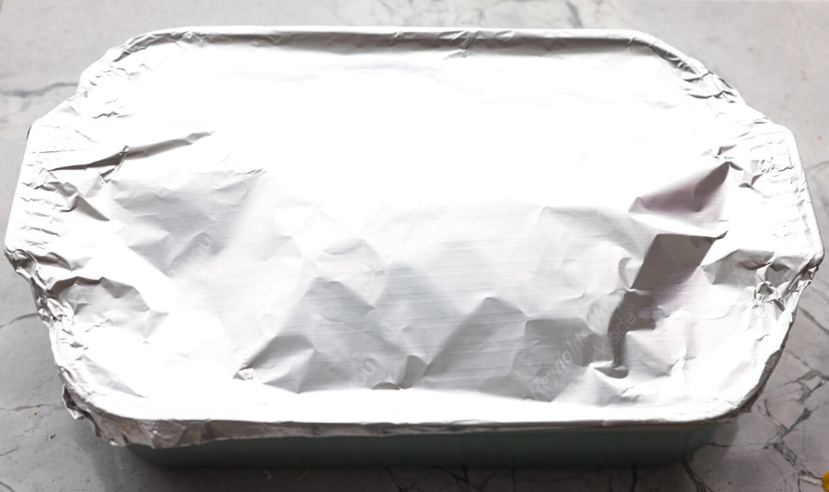 If you’ve never had Tennessee onions, bless your heart! Sweet onions bake in butter and gooey cheese until they’re golden, bubbly, and downright sinful. The perfect side to complement steak, chicken, burgers, or your favorite BBQ. Aluminum foil wrapped over the top of the baking dish.