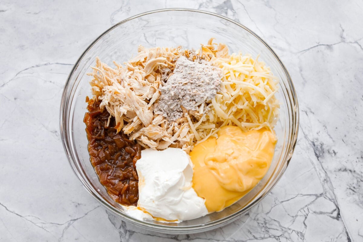 Casserole ingredients all added to a mixing bowl. 