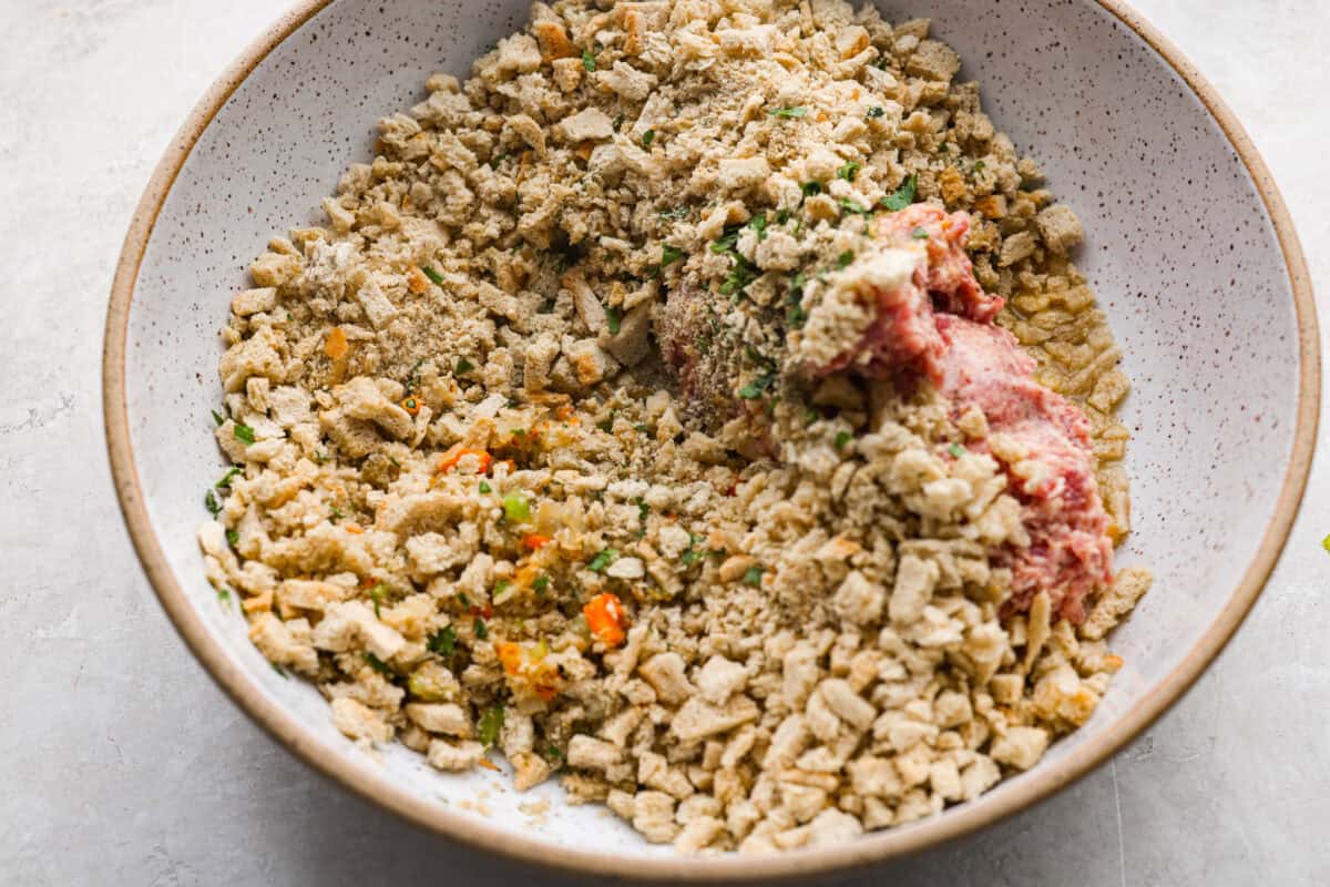 Stuffing ad sausage added to a bowl with the cooked veggies. 