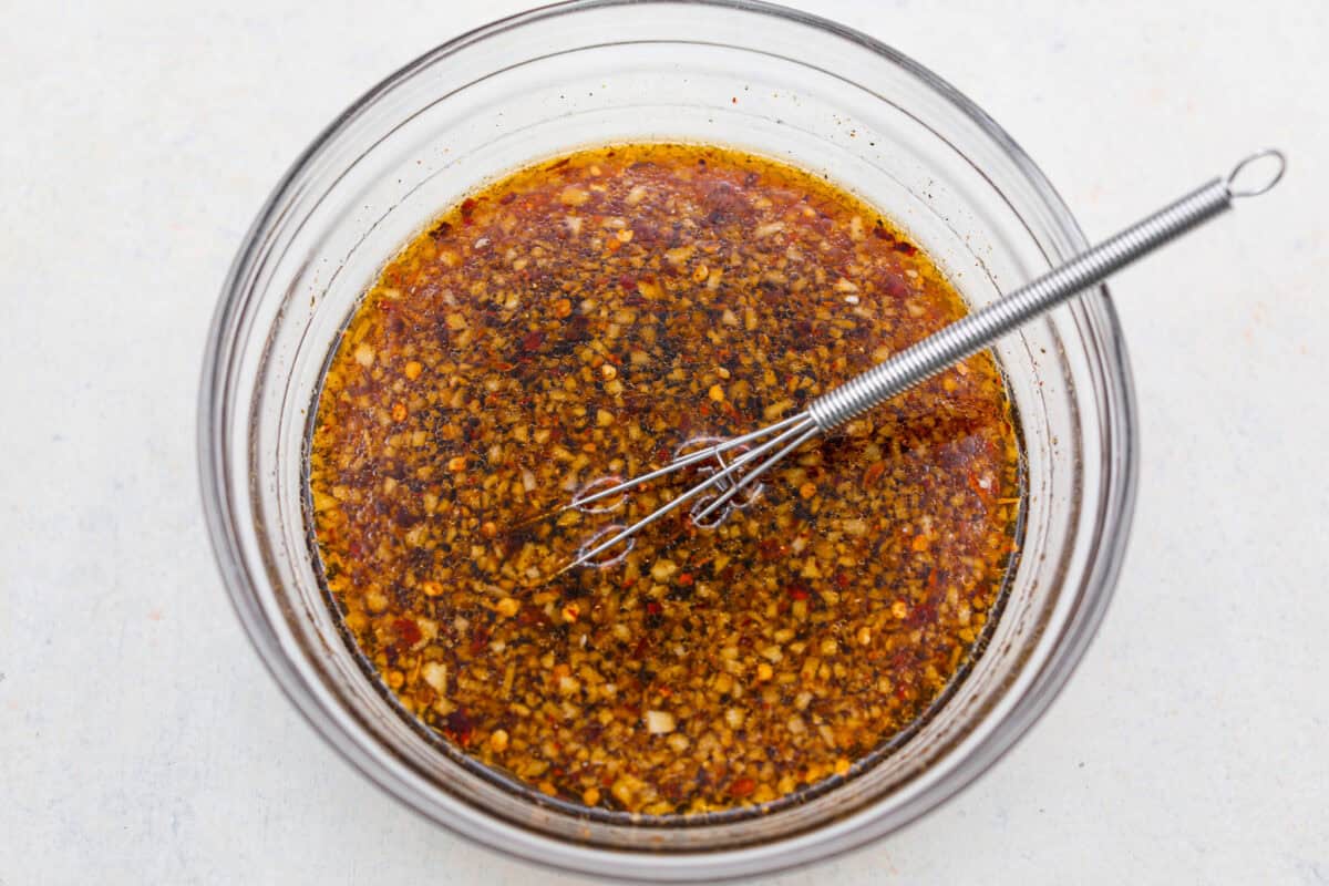 Set it and forget it! This slow cooker Korean BBQ chicken is sweet, savory, and just the right amount of spice. Perfect for tossing over rice, piling onto buns, topping a salad, or even making tacos. Weeknight dinner just got easier! All of the ingredients of the sauce added to a bowl and whisked together.