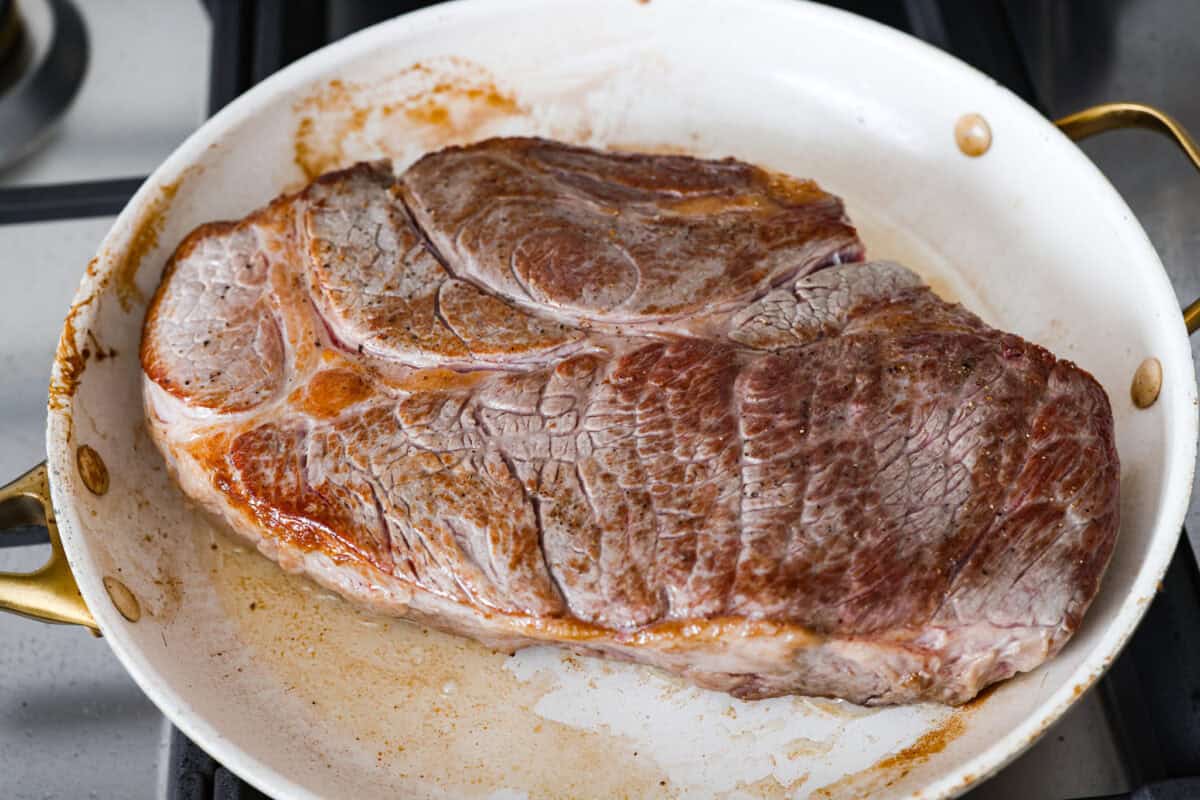 My Slow Cooker Italian Beef is tender, juicy, and loaded with zesty Italian flavor. The secret's in the way you sear the beef! This creates melt-in-your-mouth meat perfect for sandwiches or hearty dinners. Roast searing in a pan on the stove.