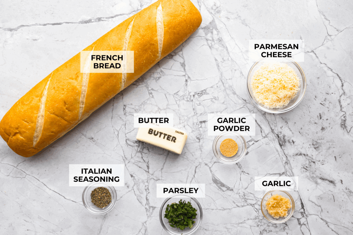 You all loved my best homemade garlic bread so much that an air fryer version was a must! It’s got the same buttery, garlicky magic, just quicker, crispier, and even easier. Overhead shot of labeled ingredients.