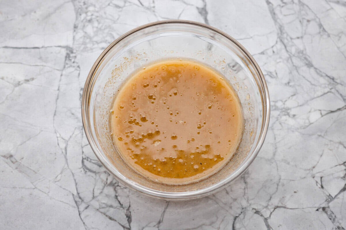 Brown Sugar glazed carrots are that sneaky-simple side that always gets rave reviews. The brown sugar caramelizes into the best buttery sweetness, and somehow everyone ends up going back for seconds. Sauce ingredients all mixed together in a bowl.