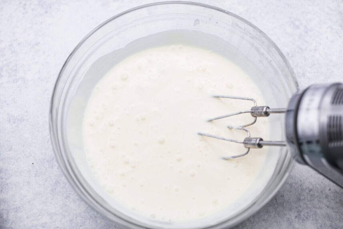 Someone added the gelatin and the cream cheese mixture together with a hand mixture. 