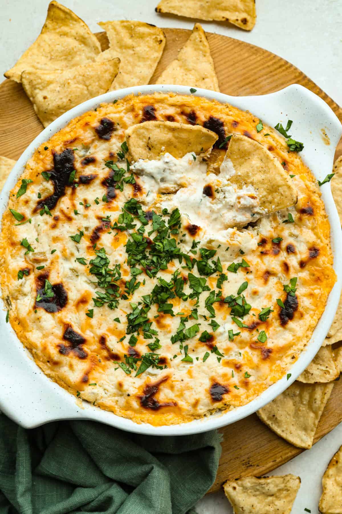 This green chile dip is warm, creamy, and so easy! The best part is, you get to control the heat! I'm telling you, the flavor hits bigger than the ingredient list! Make this for your next get-together, or let's be real, lunch! Overhead shot of green chile dip.