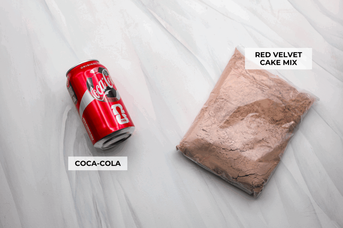 Overhead shot of labeled 2 ingredient red velvet cake ingredients. 