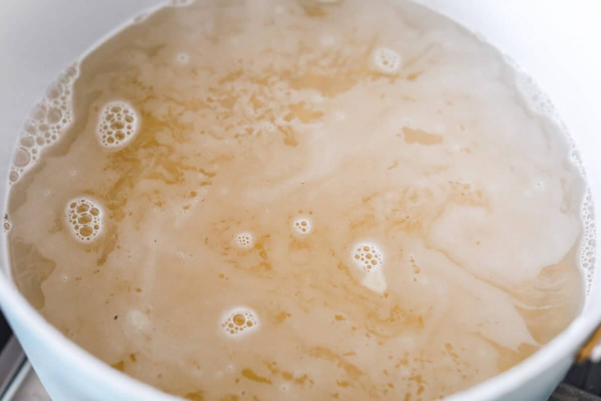 If you love my minestrone soup even a little, you have to try this minestrone casserole. It takes the cozy, veggie packed soup you already love and turns it into a hearty, cheesy pasta bake. It feels like weeknight dinner perfection. Pot with pasta cooking in boiling water.