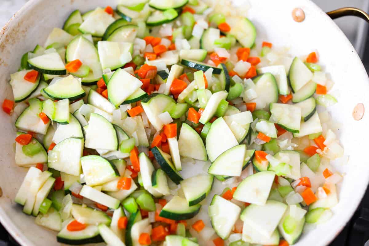 If you love my minestrone soup even a little, you have to try this minestrone casserole. It takes the cozy, veggie packed soup you already love and turns it into a hearty, cheesy pasta bake. It feels like weeknight dinner perfection. Garlic and zucchini added to the veggies.