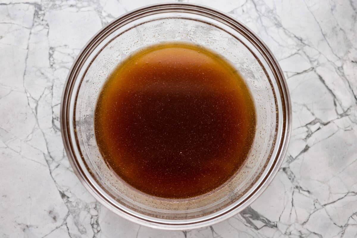 Bowl of sauce ingredients whisked together. 