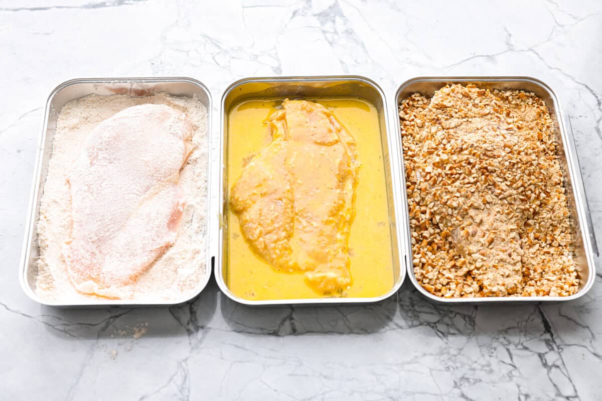 This pretzel crusted chicken takes crispy chicken to the next level. The crunchy pretzel coating adds incredible flavor and texture, making every bite extra delicious. Chicken in each breading station container.