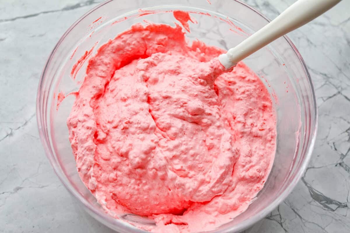 This cottage cheese jello salad is one of those old-school recipes that never really goes out of style. My dad absolutely loves it and requests it all the time, especially for family get-togethers. It’s creamy, fruity, and ridiculously easy to make. Everything mixed together and ready to be chilled.