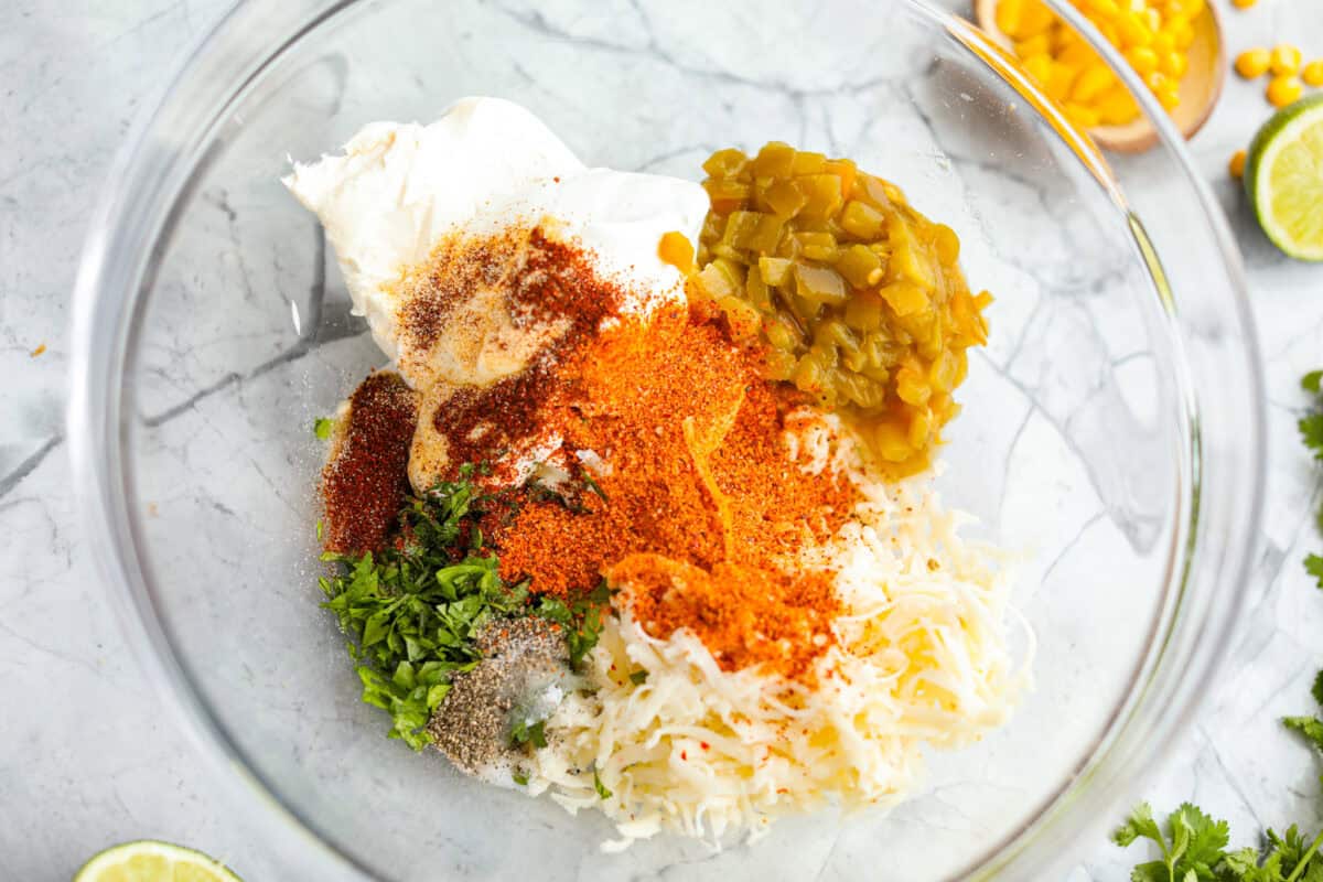 All of the sauce ingredients added to a bowl. 