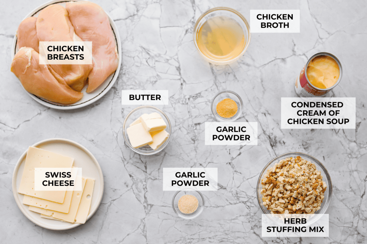 Okay, this Swiss Chicken Casserole is my go-to when I don’t feel like cooking. You basically throw it together, pop it in the oven, and somehow end up with super tender chicken, melty Swiss cheese, and the creamiest sauce. Overhead shot of labeled ingredients.